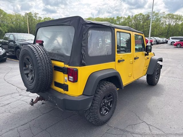 2015 Baja Yellow Clearcoat Jeep Wrangler Unlimited Sport 4X4 SUV