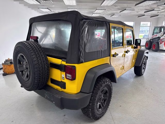 2015 Baja Yellow Clearcoat Jeep Wrangler Unlimited Sport 4X4 SUV