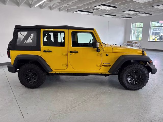 2015 Baja Yellow Clearcoat Jeep Wrangler Unlimited Sport 4X4 SUV