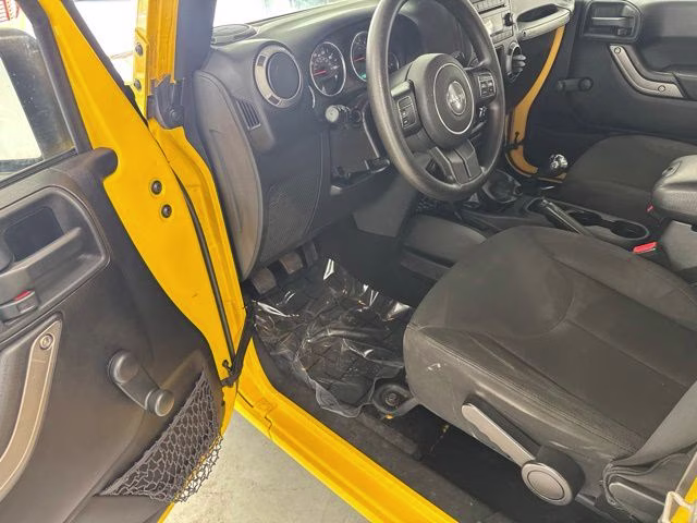 2015 Baja Yellow Clearcoat Jeep Wrangler Unlimited Sport 4X4 SUV