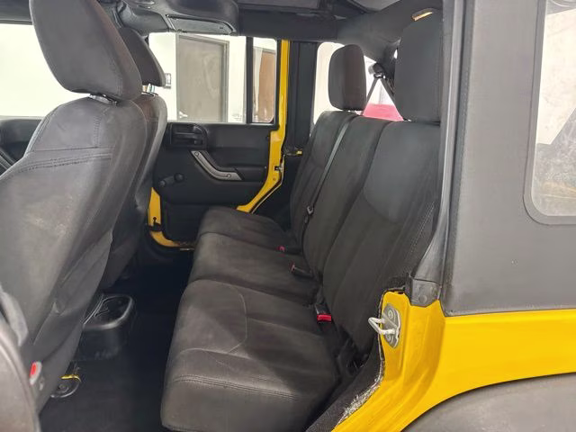 2015 Baja Yellow Clearcoat Jeep Wrangler Unlimited Sport 4X4 SUV