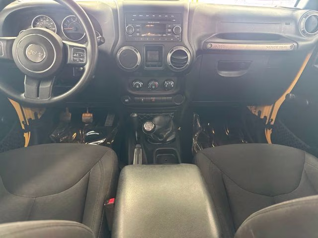 2015 Baja Yellow Clearcoat Jeep Wrangler Unlimited Sport 4X4 SUV
