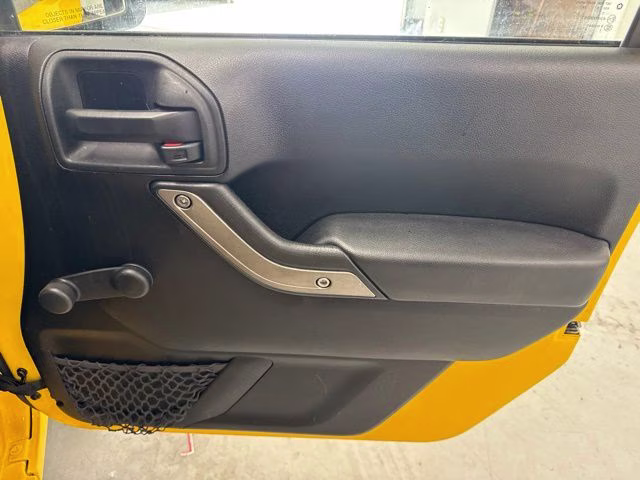 2015 Baja Yellow Clearcoat Jeep Wrangler Unlimited Sport 4X4 SUV