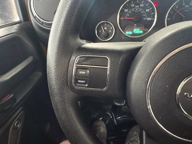 2015 Baja Yellow Clearcoat Jeep Wrangler Unlimited Sport 4X4 SUV