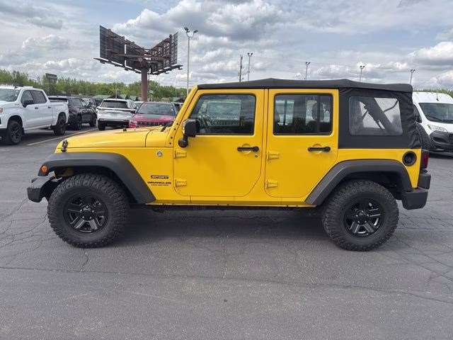 2015 Baja Yellow Clearcoat Jeep Wrangler Unlimited Sport 4X4 SUV