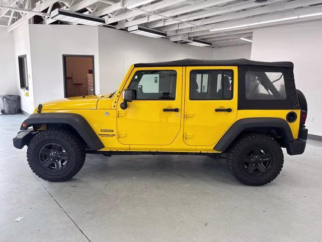 2015 Baja Yellow Clearcoat Jeep Wrangler Unlimited Sport 4X4 SUV