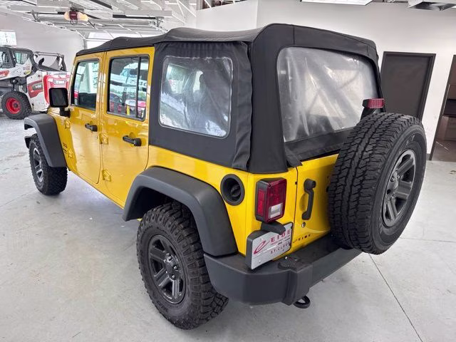 2015 Baja Yellow Clearcoat Jeep Wrangler Unlimited Sport 4X4 SUV