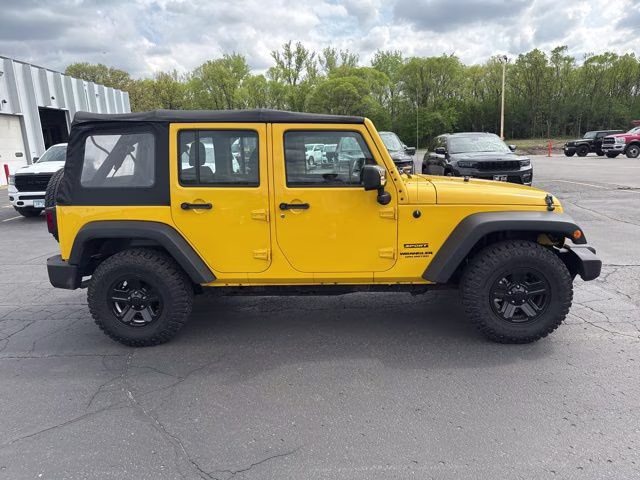 2015 Baja Yellow Clearcoat Jeep Wrangler Unlimited Sport 4X4 SUV