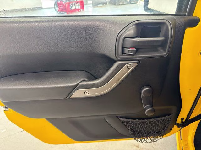 2015 Baja Yellow Clearcoat Jeep Wrangler Unlimited Sport 4X4 SUV