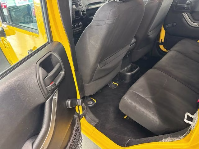 2015 Baja Yellow Clearcoat Jeep Wrangler Unlimited Sport 4X4 SUV