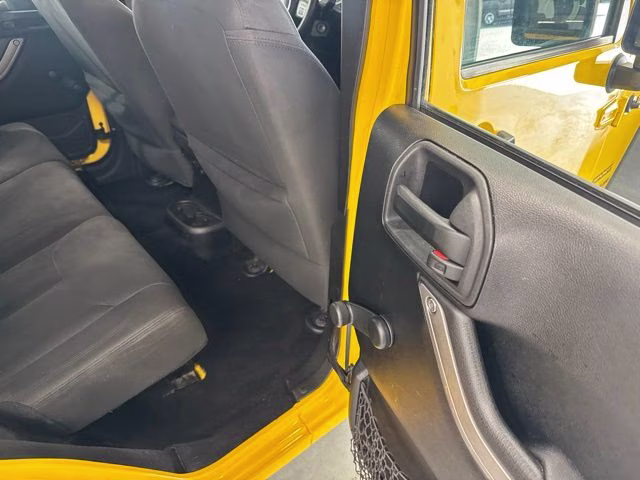 2015 Baja Yellow Clearcoat Jeep Wrangler Unlimited Sport 4X4 SUV