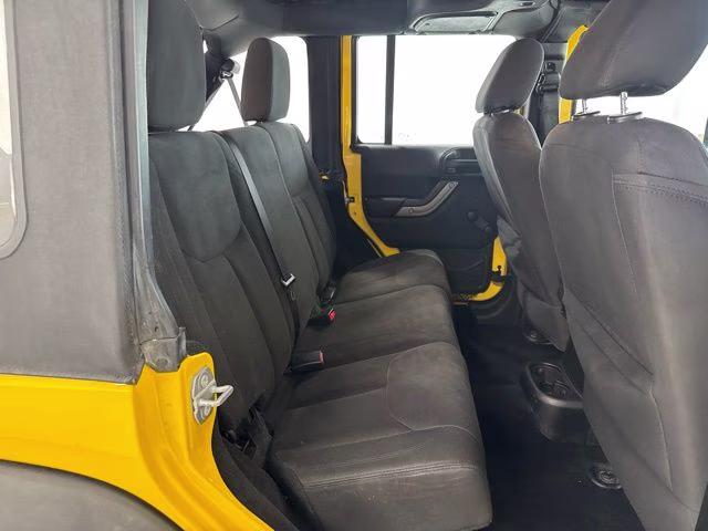 2015 Baja Yellow Clearcoat Jeep Wrangler Unlimited Sport 4X4 SUV