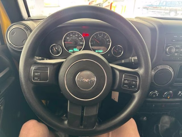 2015 Baja Yellow Clearcoat Jeep Wrangler Unlimited Sport 4X4 SUV