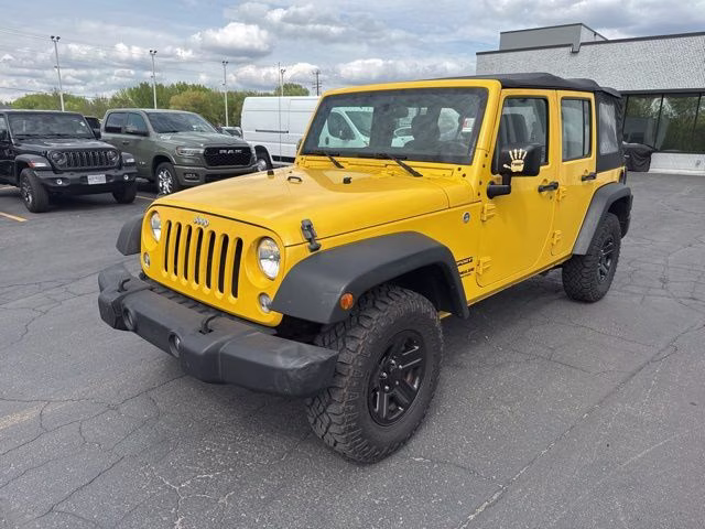2015 Baja Yellow Clearcoat Jeep Wrangler Unlimited Sport 4X4 SUV