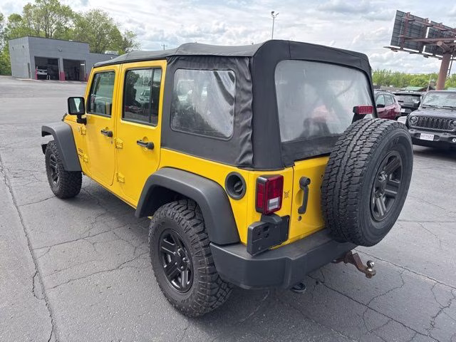 2015 Baja Yellow Clearcoat Jeep Wrangler Unlimited Sport 4X4 SUV