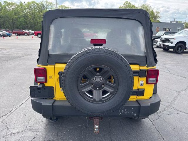 2015 Baja Yellow Clearcoat Jeep Wrangler Unlimited Sport 4X4 SUV