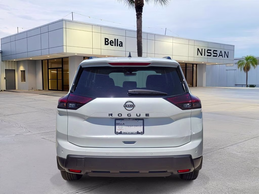 2026 Everest White Pearl Tricoat Nissan Rogue Dark Armor FWD SUV