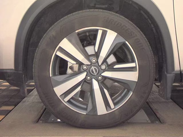2024 Champagne Silver Metallic Nissan Rogue SL AWD SUV