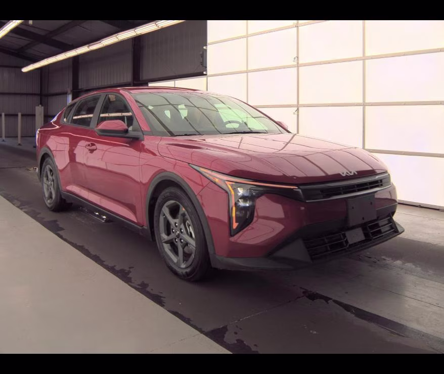 2025 Currant Red Kia K4 LXS FWD Sedan