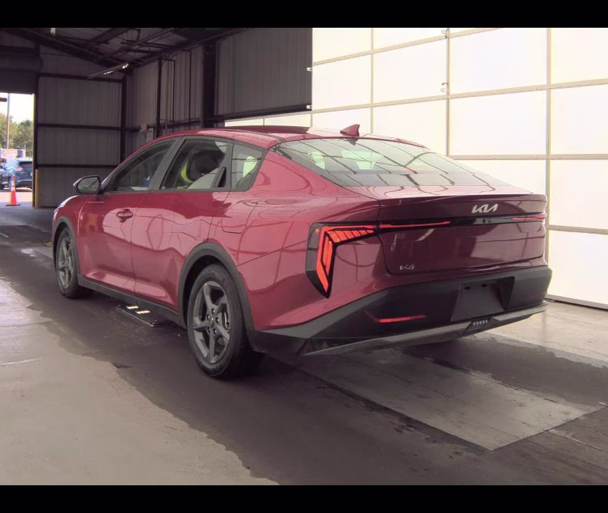 2025 Currant Red Kia K4 LXS FWD Sedan