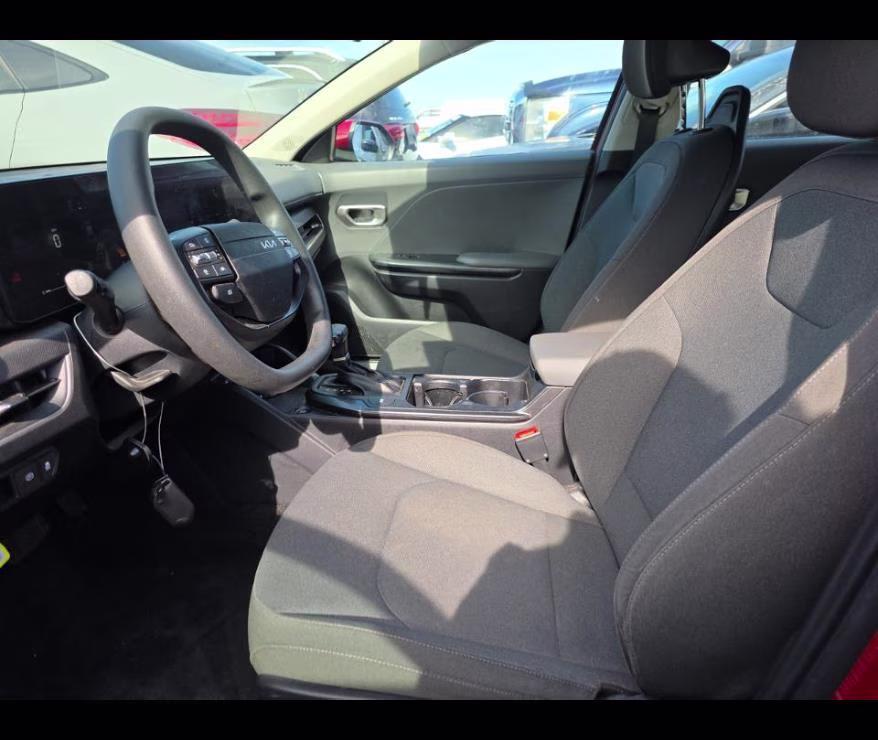 2025 Currant Red Kia K4 LXS FWD Sedan