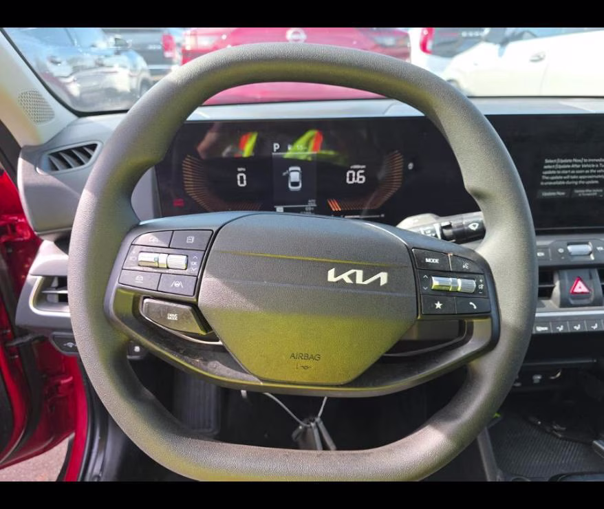 2025 Currant Red Kia K4 LXS FWD Sedan
