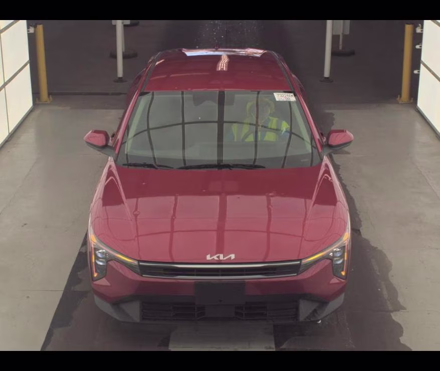 2025 Currant Red Kia K4 LXS FWD Sedan