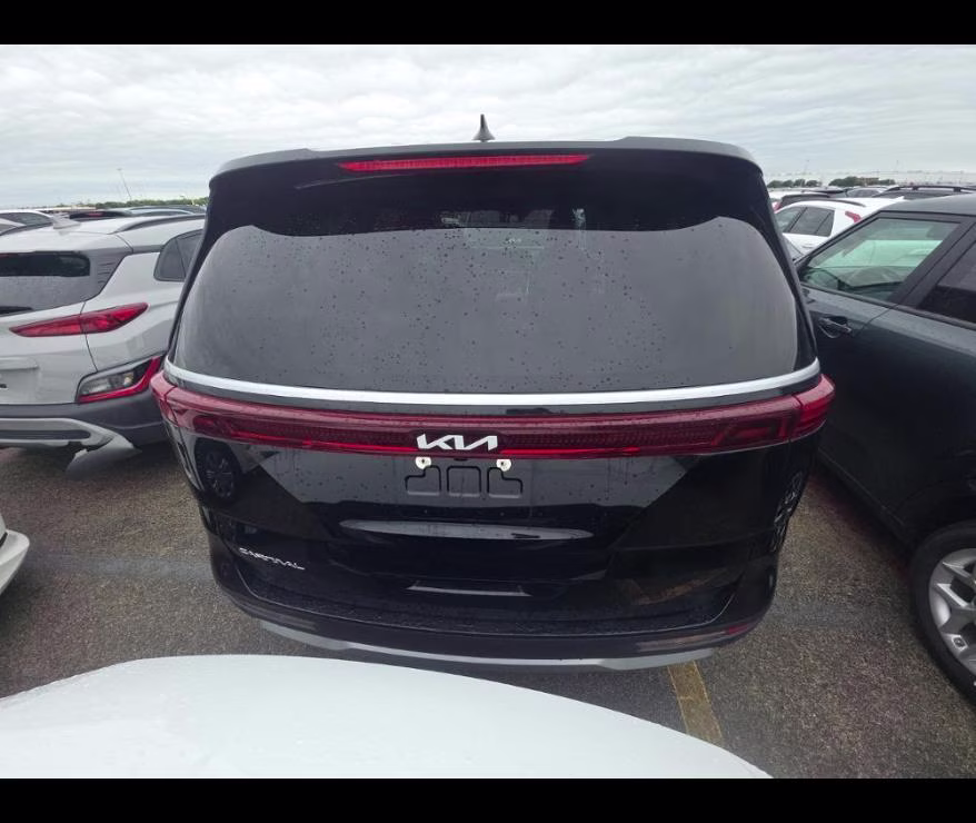 2024 Aurora Black Pearl Kia Carnival LX FWD Van