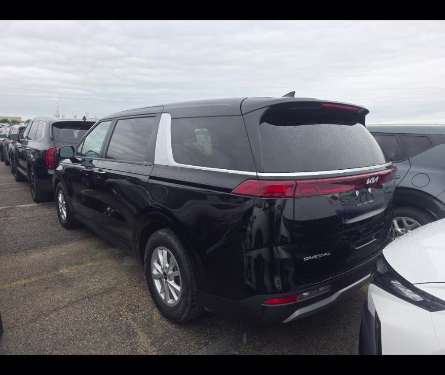 2024 Aurora Black Pearl Kia Carnival LX FWD Van