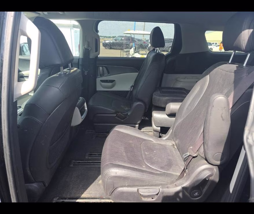 2024 Aurora Black Pearl Kia Carnival LX FWD Van