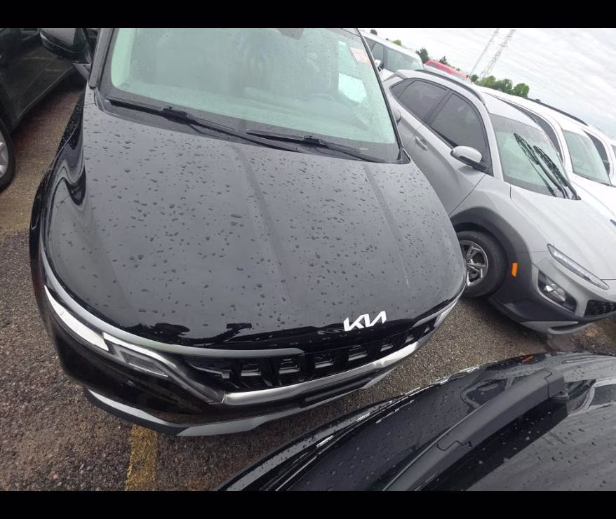 2024 Aurora Black Pearl Kia Carnival LX FWD Van
