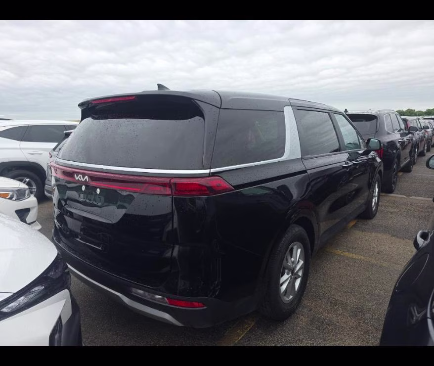 2024 Aurora Black Pearl Kia Carnival LX FWD Van