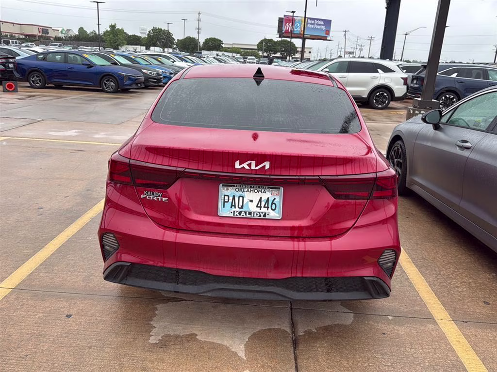 2024 Currant Red Kia Forte LXS FWD Sedan