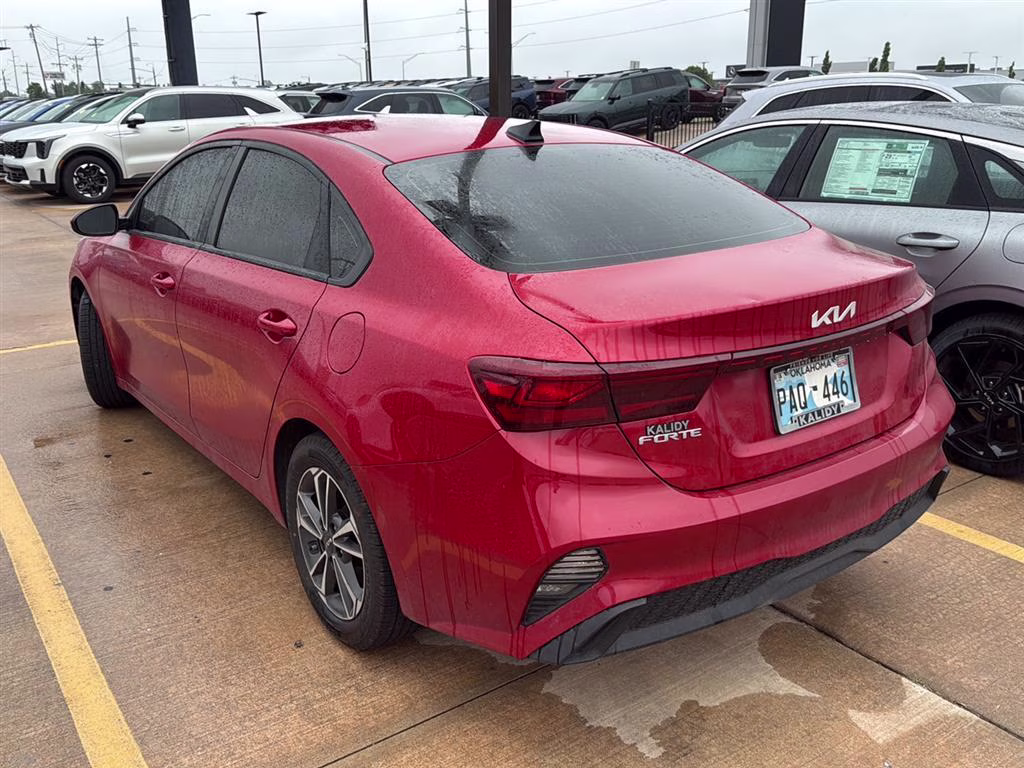 2024 Currant Red Kia Forte LXS FWD Sedan