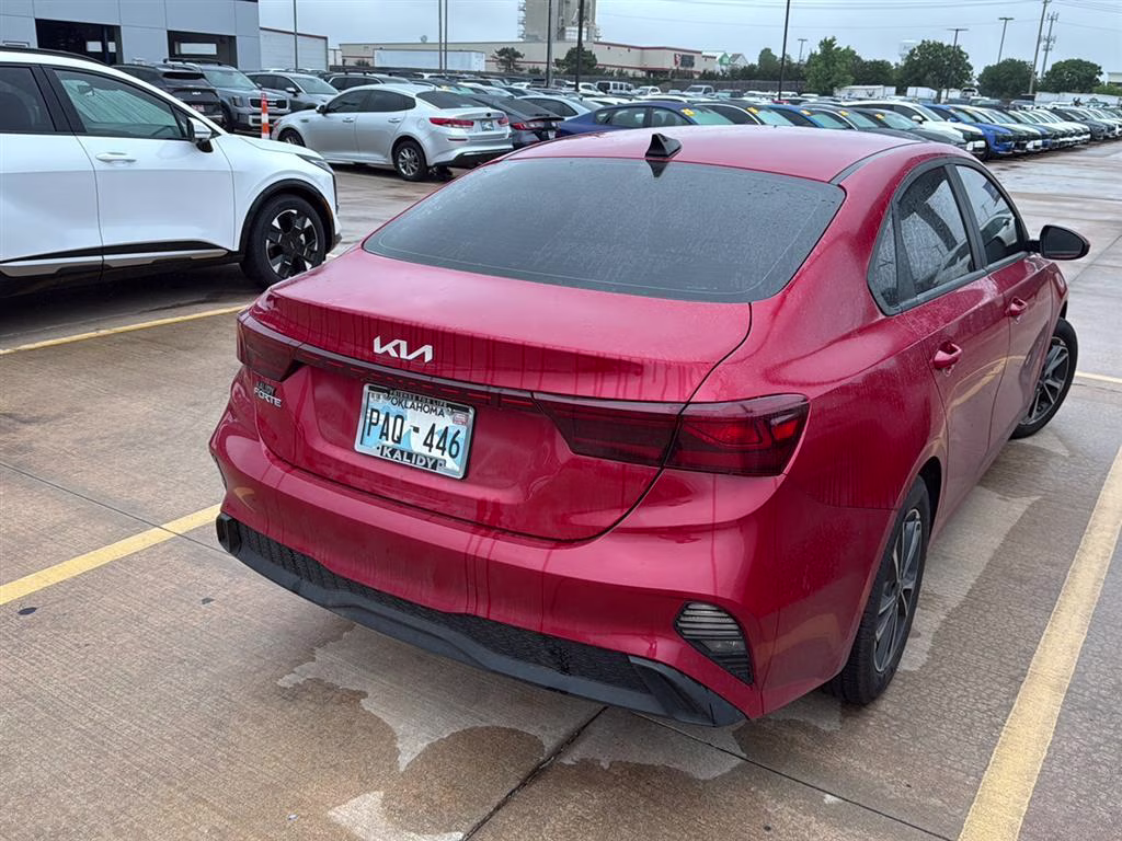 2024 Currant Red Kia Forte LXS FWD Sedan