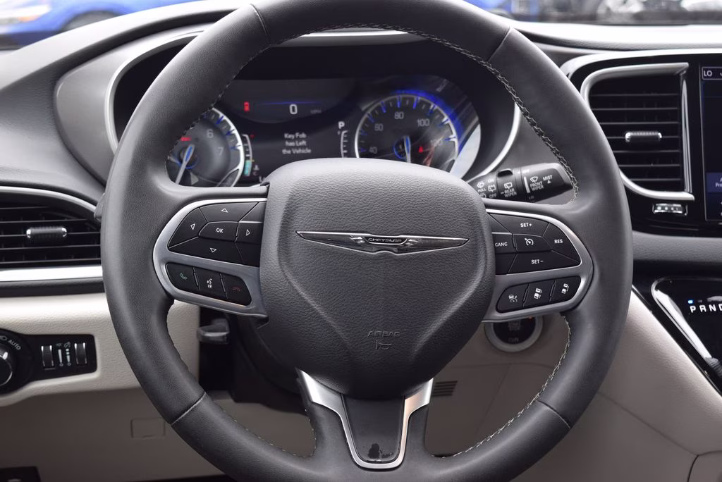 2023 Brilliant Black Clearcoat Chrysler Pacifica Touring L FWD Van