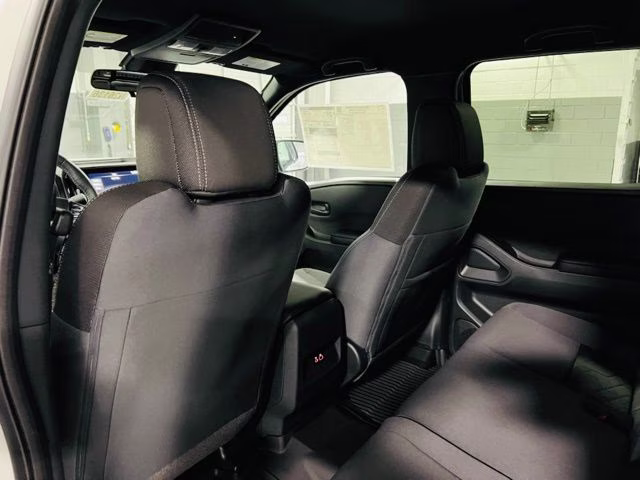 2026 Glacier White Nissan Frontier SV RWD Truck