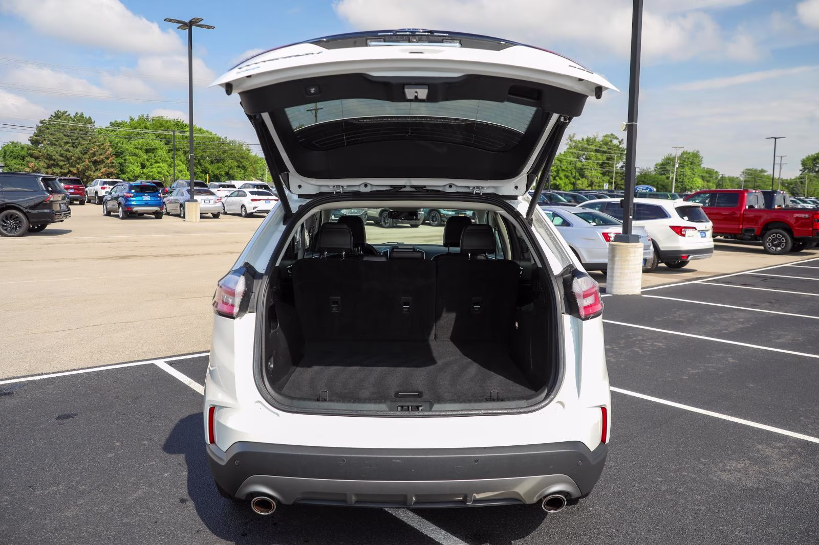 2024 Star White Metallic Tri-Coat Ford Edge Titanium AWD SUV