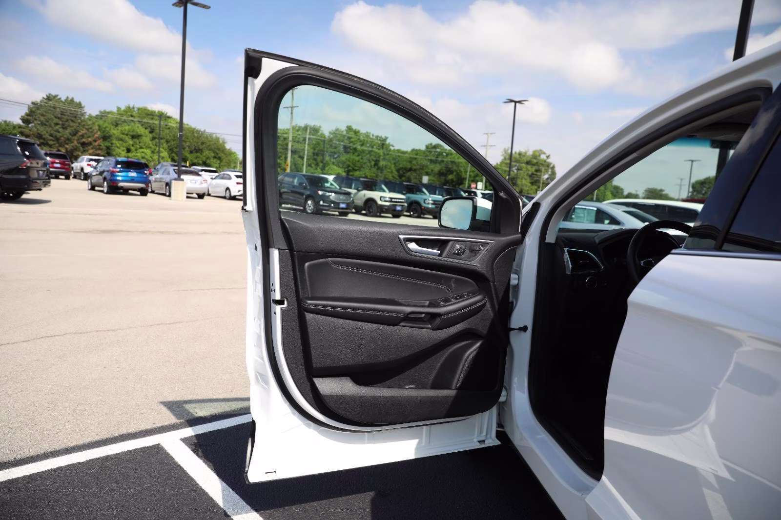 2024 Star White Metallic Tri-Coat Ford Edge Titanium AWD SUV