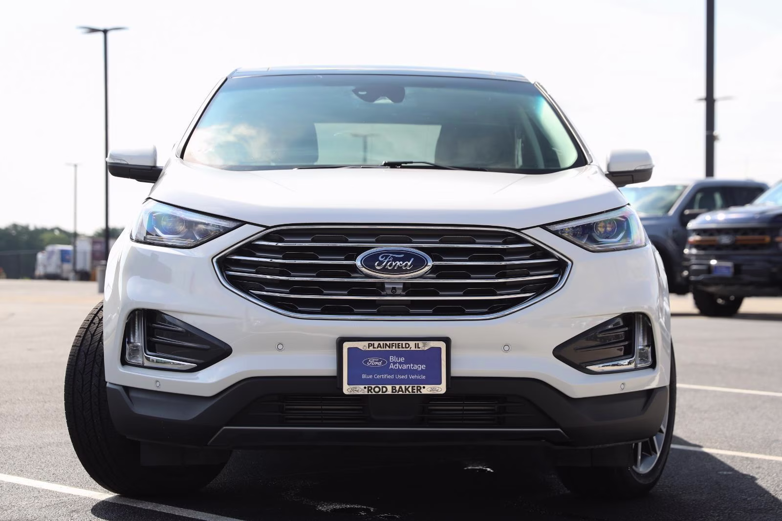 2024 Star White Metallic Tri-Coat Ford Edge Titanium AWD SUV