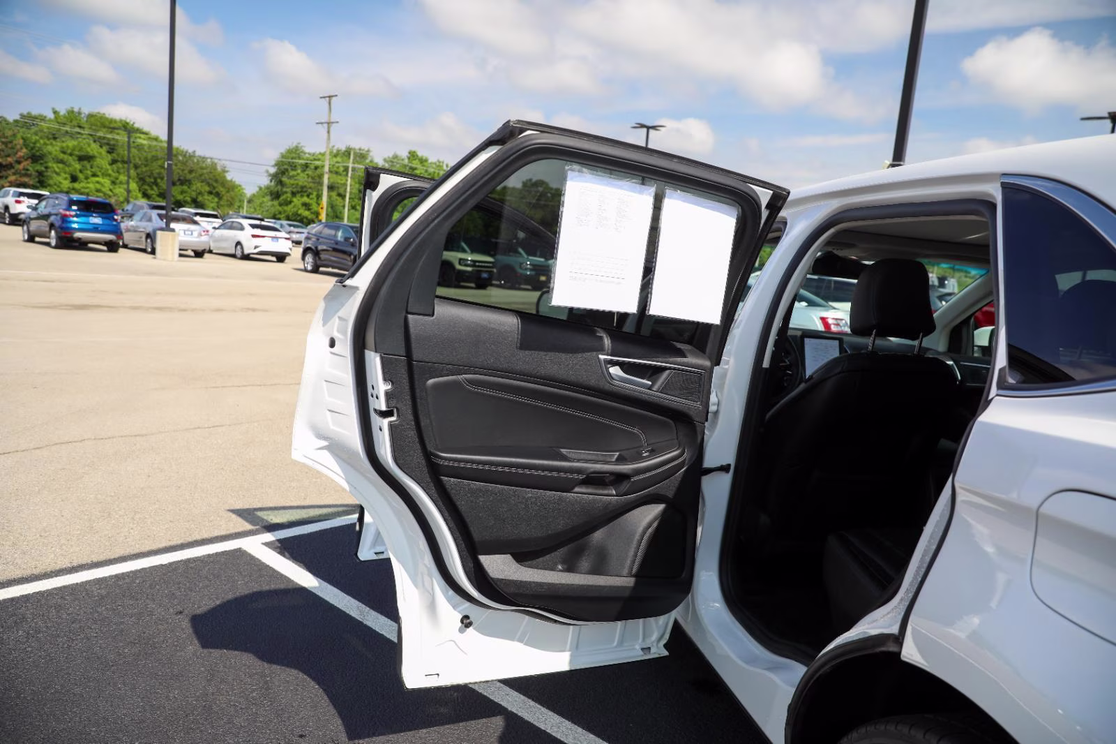 2024 Star White Metallic Tri-Coat Ford Edge Titanium AWD SUV