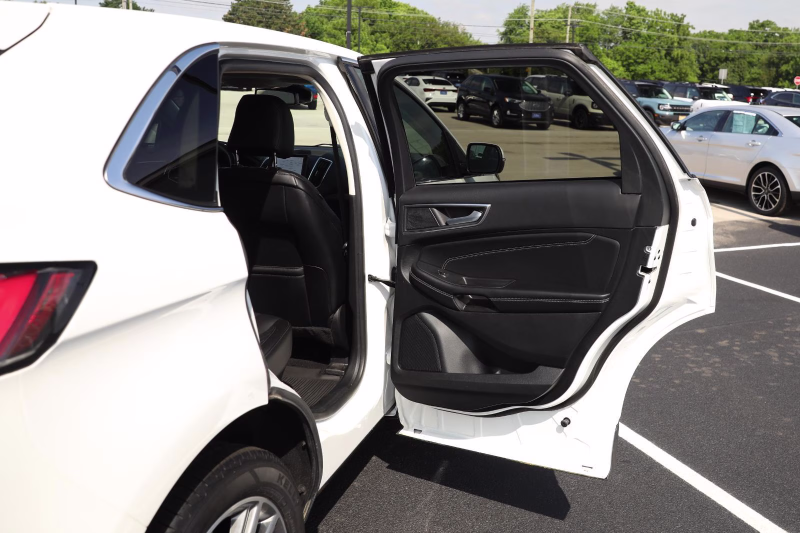 2024 Star White Metallic Tri-Coat Ford Edge Titanium AWD SUV