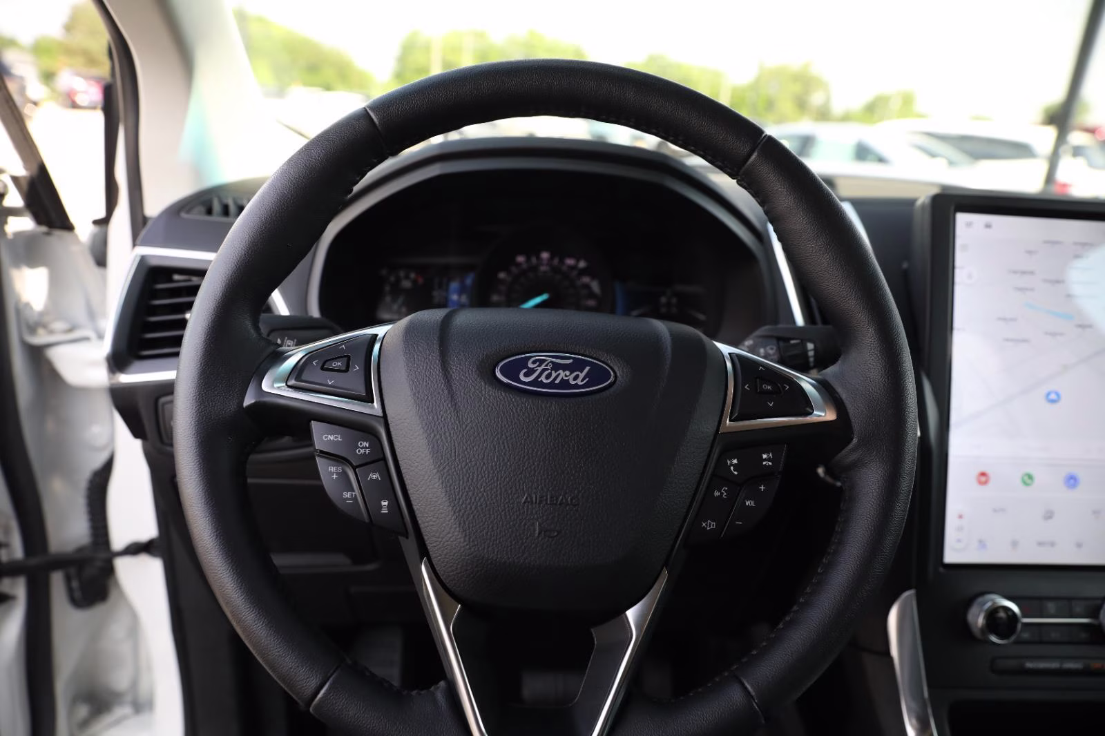 2024 Star White Metallic Tri-Coat Ford Edge Titanium AWD SUV