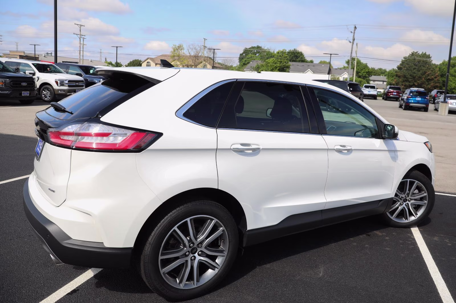 2024 Star White Metallic Tri-Coat Ford Edge Titanium AWD SUV