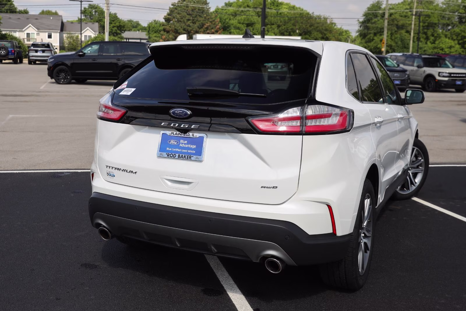 2024 Star White Metallic Tri-Coat Ford Edge Titanium AWD SUV