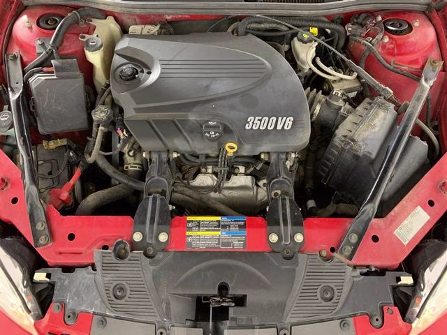 2009 Victory Red Chevrolet Impala LT FWD Sedan