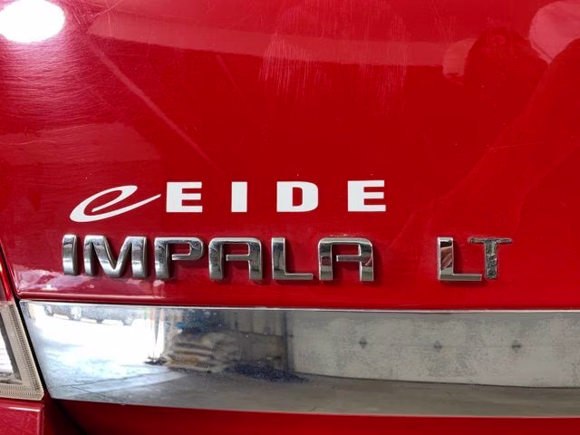 2009 Victory Red Chevrolet Impala LT FWD Sedan
