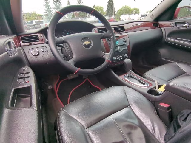 2009 Victory Red Chevrolet Impala LT FWD Sedan