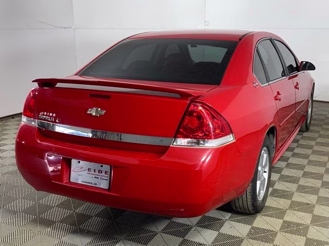 2009 Victory Red Chevrolet Impala LT FWD Sedan