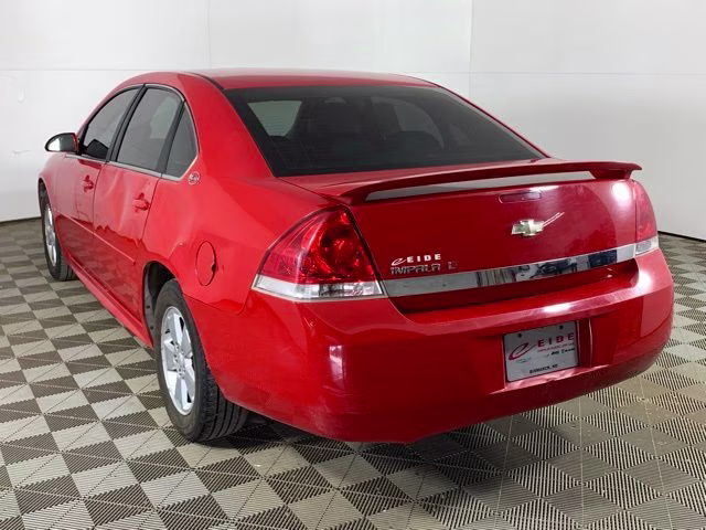 2009 Victory Red Chevrolet Impala LT FWD Sedan